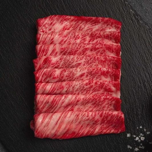 Thinly sliced Japanese A5 Wagyu chuck roll with fine marbling