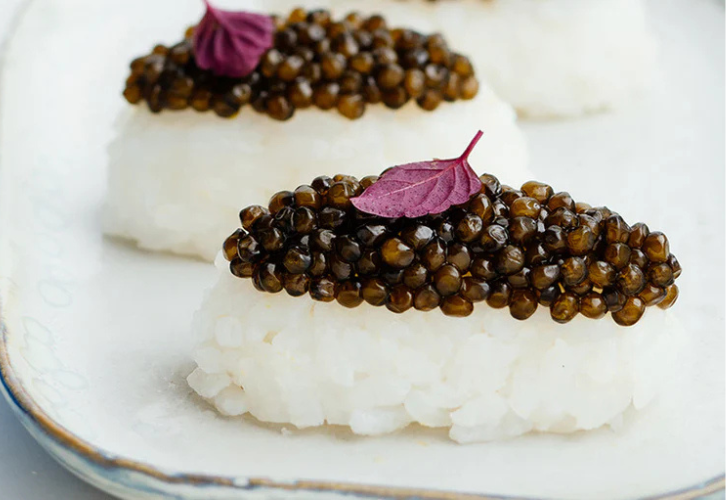 Nigiri sushi topped with luxurious Imperial Gold Caviar on sushi rice