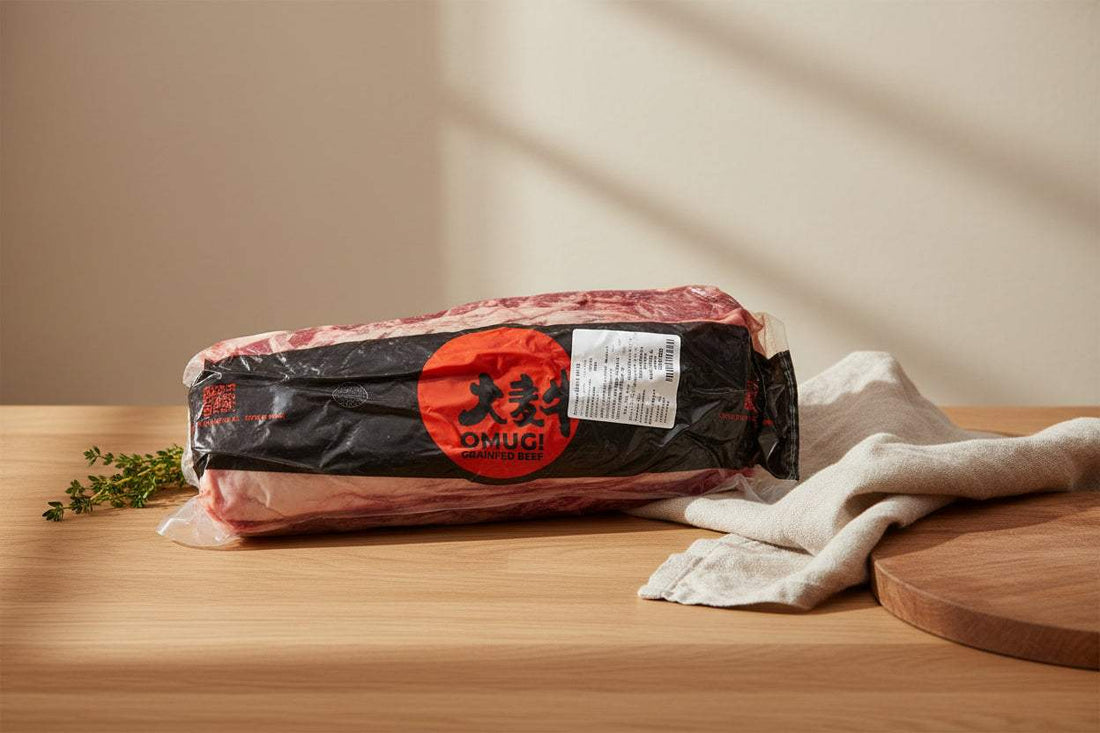 Whole grain-fed beef ribeye from Omugi, Australian grain-fed, raw and marbled