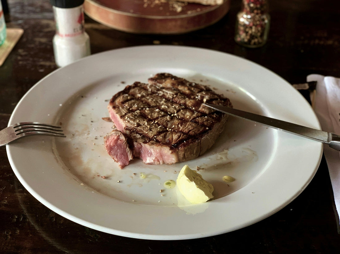 Plated steak prepared for a two-person tasting
