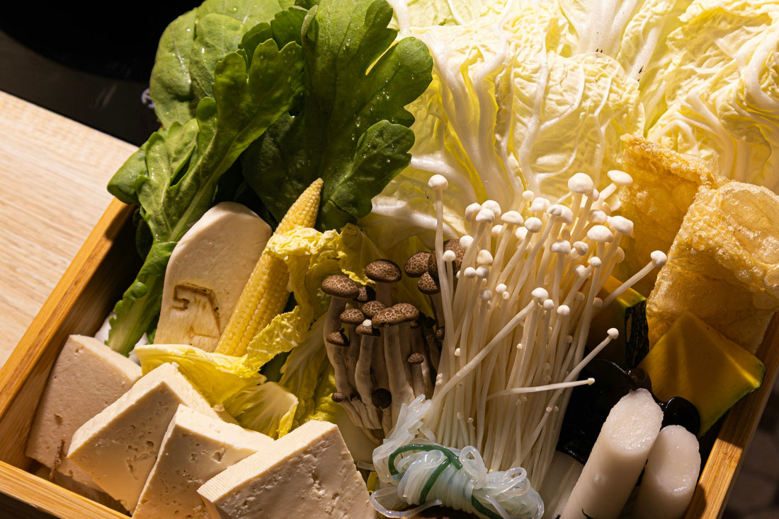 Assorted vegetables and tofu prepared for a Japanese-style hot-pot meal