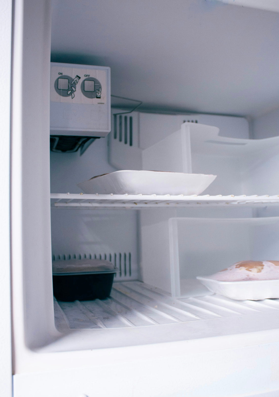 Open refrigerator and freezer with stored food; editorial image for the Wagyu storage guide