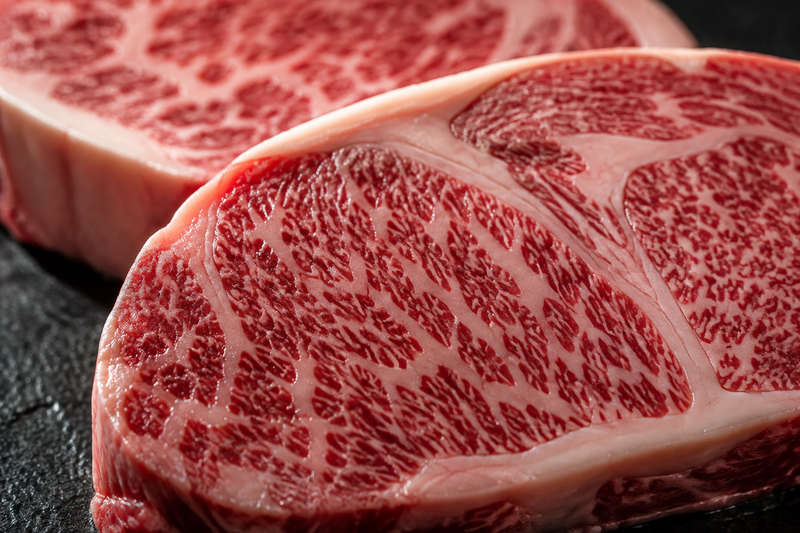 Macro view of marbling in a Japanese-style ribeye for a Kobe Beef BMS guide