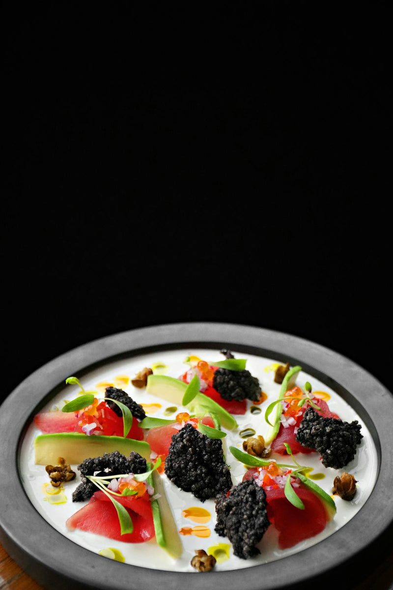 Elegant German New Year's Eve Silvester dinner table with caviar and festive decor