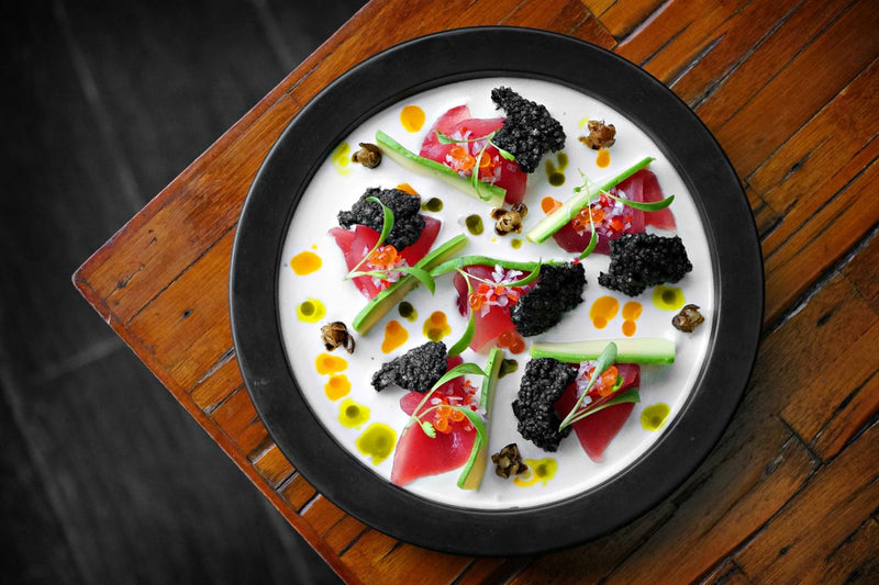 Spanish New Year's Eve Nochevieja table setting with grapes caviar and cava