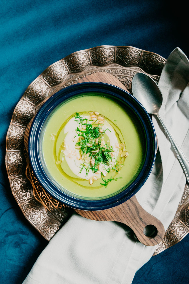 Baked egg in cream with caviar in white ramekin