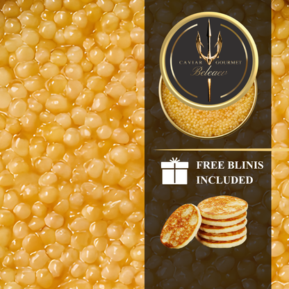 Almaz Diamond Caviar set with golden yellow eggs and cocktail blinis on a plate