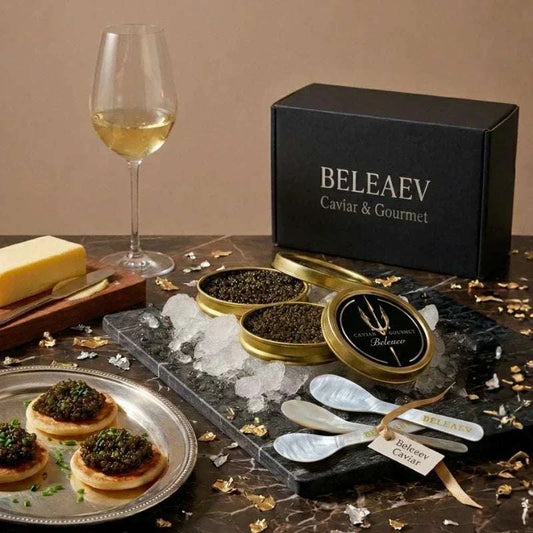 Luxury caviar birthday gift hamper with Oscietra Royal caviar, Tunworth Camembert, hot honey, blinis, and mother-of-pearl spoon