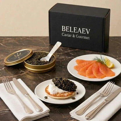 Caviar brunch box with Oscietra Royal caviar, smoked salmon, crème fraîche, blinis, and mother-of-pearl spoon for two