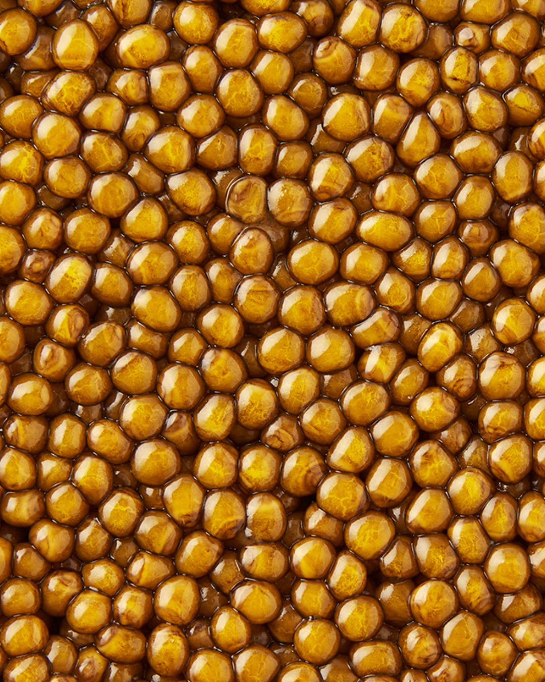 Golden Oscietra special reserve caviar with luminous golden pearls