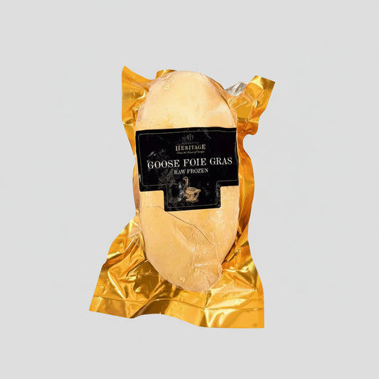 Packaged goose foie gras on a marble surface