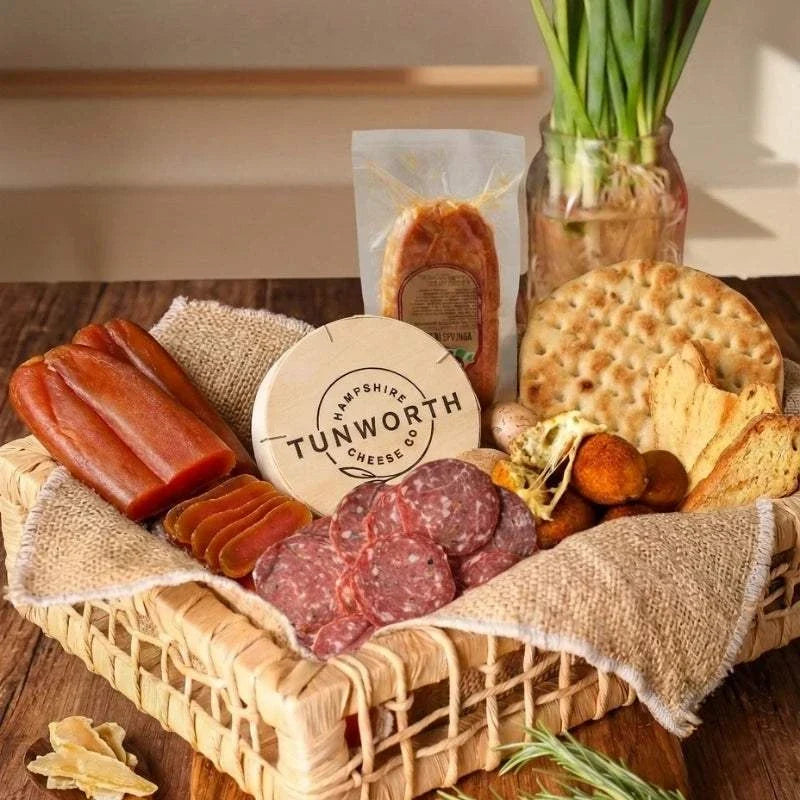 Italian grazing board with cured meats, truffle arancini, Tunworth cheese, hot honey and flatbread