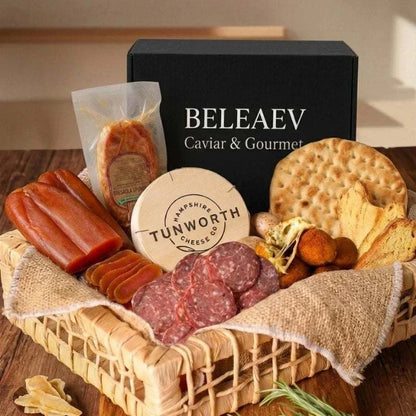 Italian grazing board with nduja, Coppa, Finocchiona, bottarga, truffle arancini, Tunworth cheese, hot honey, and flatbread