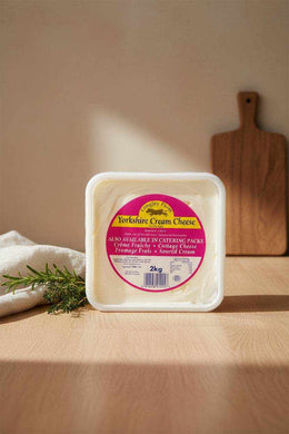 Longley Farm Cream Cheese 2kg full-fat soft British cheese in a white tub with a yellow and pink label