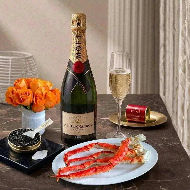 Luxury caviar hamper with Oscietra Royal caviar, king crab clusters, foie gras, blinis, and mother-of-pearl spoon