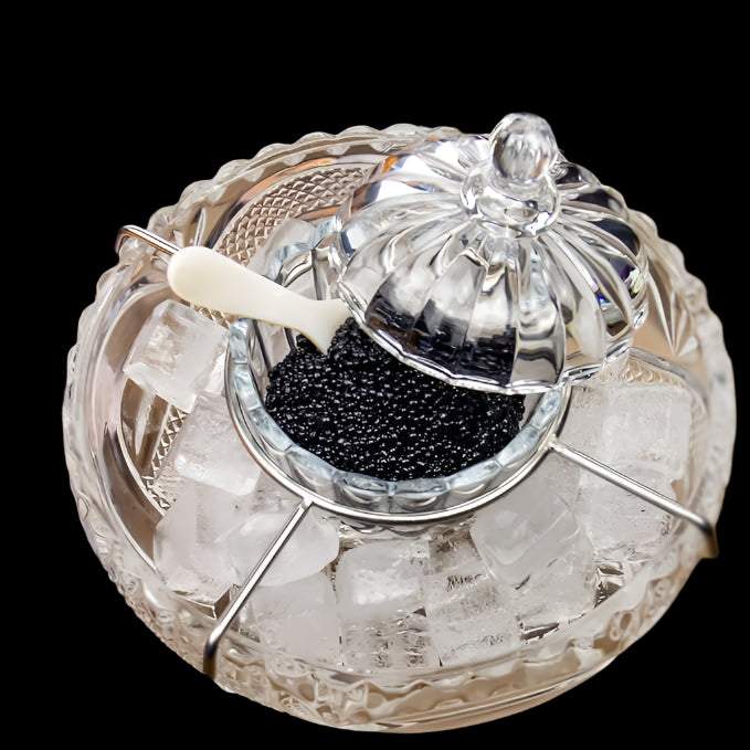 Elegant premium caviar serving set with glass chiller and mother of pearl spoons