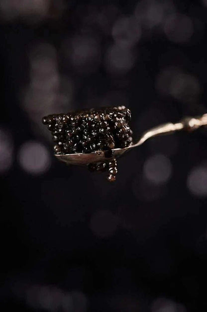 Royal Baeri Caviar medium charcoal pearls with silky texture and nutty notes