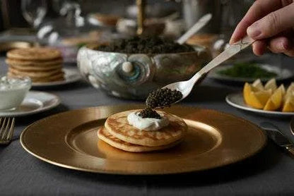 Signature hand-crafted mother of pearl caviar spoon with golden Beleaev inscription