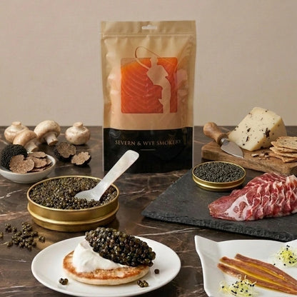 Beluga caviar gift board with Beluga Reserve and Oscietra Royal caviar, smoked salmon, aged cheese, cured meat, and accompaniments.