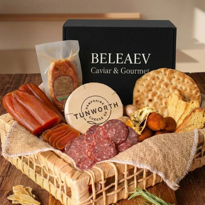 Italian grazing board with nduja, Coppa, Finocchiona, bottarga, truffle arancini, Tunworth cheese, hot honey, and flatbread