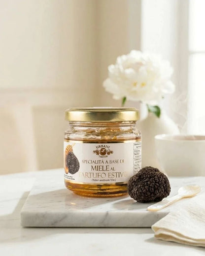 Truffle gift hamper with summer truffle carpaccio, truffle arancini, honey, cheese, and toast