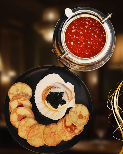 Wild salmon roe caviar set with mini blinis on black plate